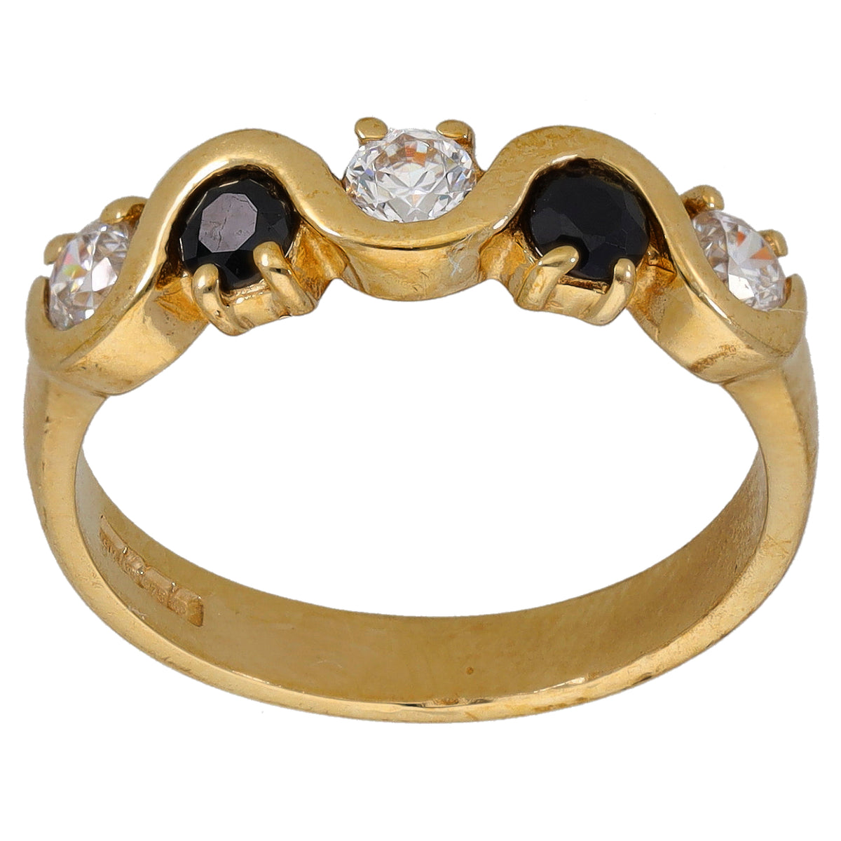 Gold ring with three bezel-set stones: clear center and dark side stones