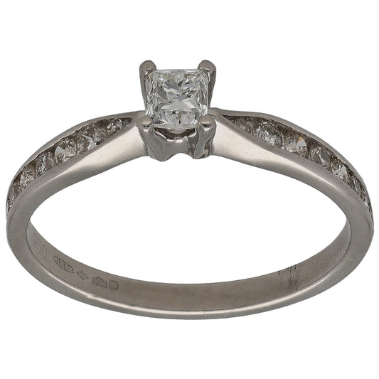 Platinum solitaire ring with square center diamond and pavé accent stones