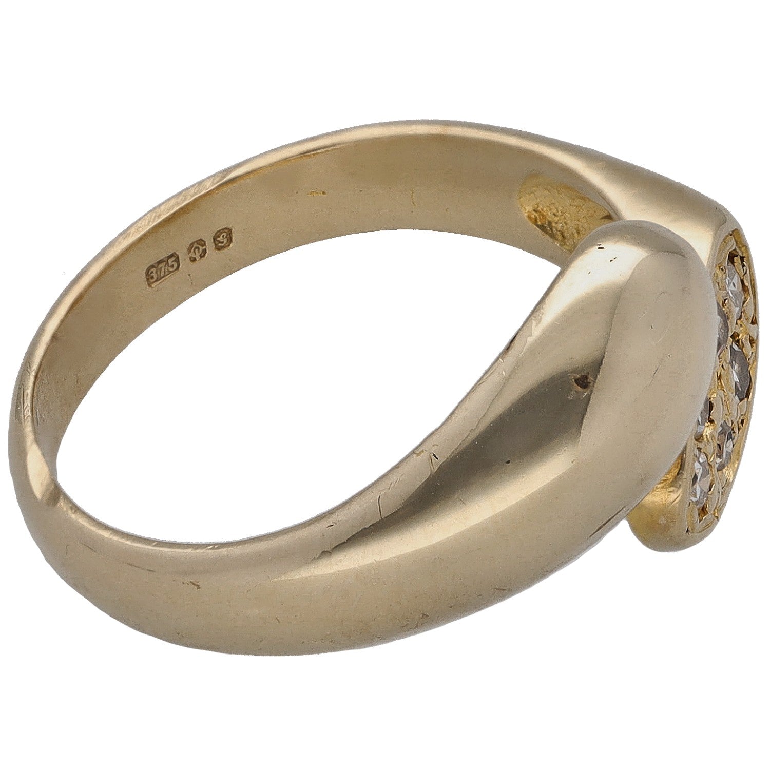 Gold ring side view with diamond cluster on top and inner hallmark, size K