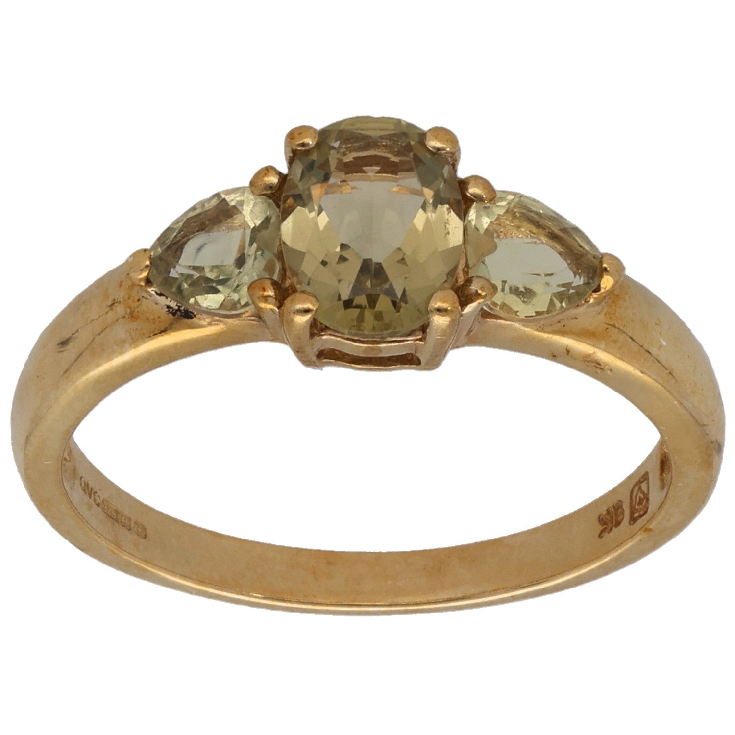 Gold three-stone quartz ring with oval center and two side stones