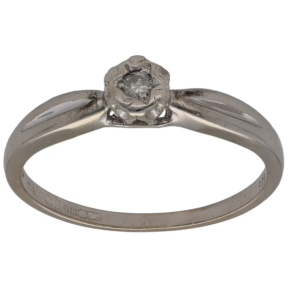 9ct white gold round diamond solitaire ring with raised four-prong setting