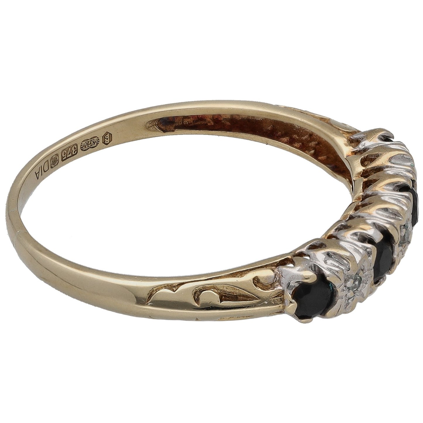 9ct gold half eternity ring side view with black round stones and detailed metalwork