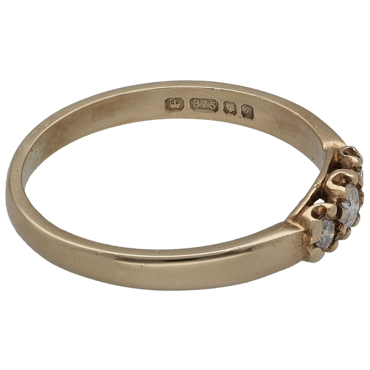 9ct gold ring with three round diamonds and 375 hallmark on the band