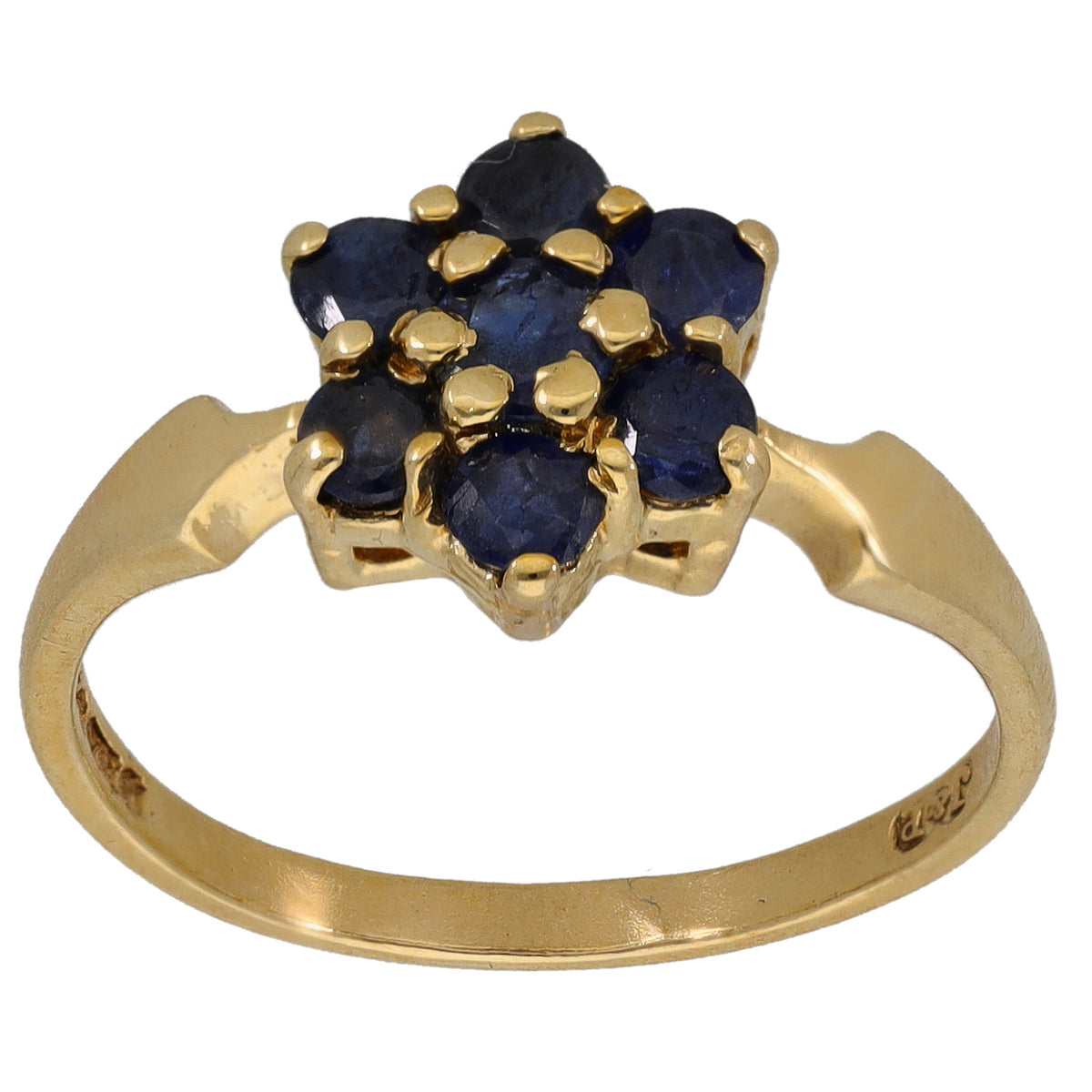 Gold sapphire cocktail ring with dark blue gemstone cluster and raised prongs