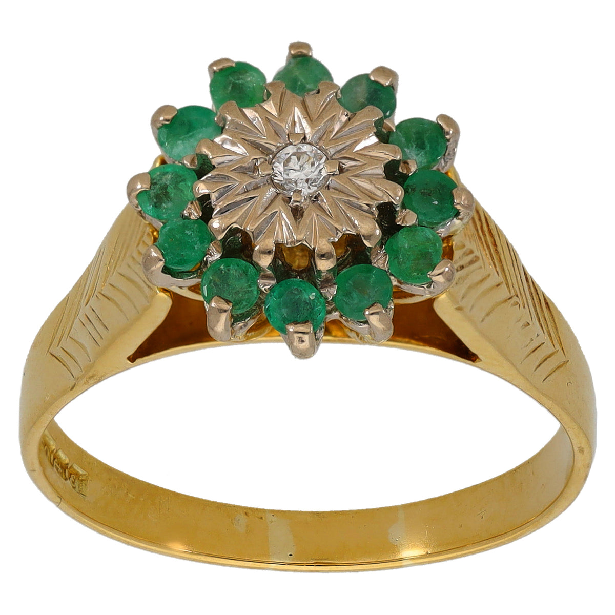 Gold cocktail ring with emerald cluster and round diamond center