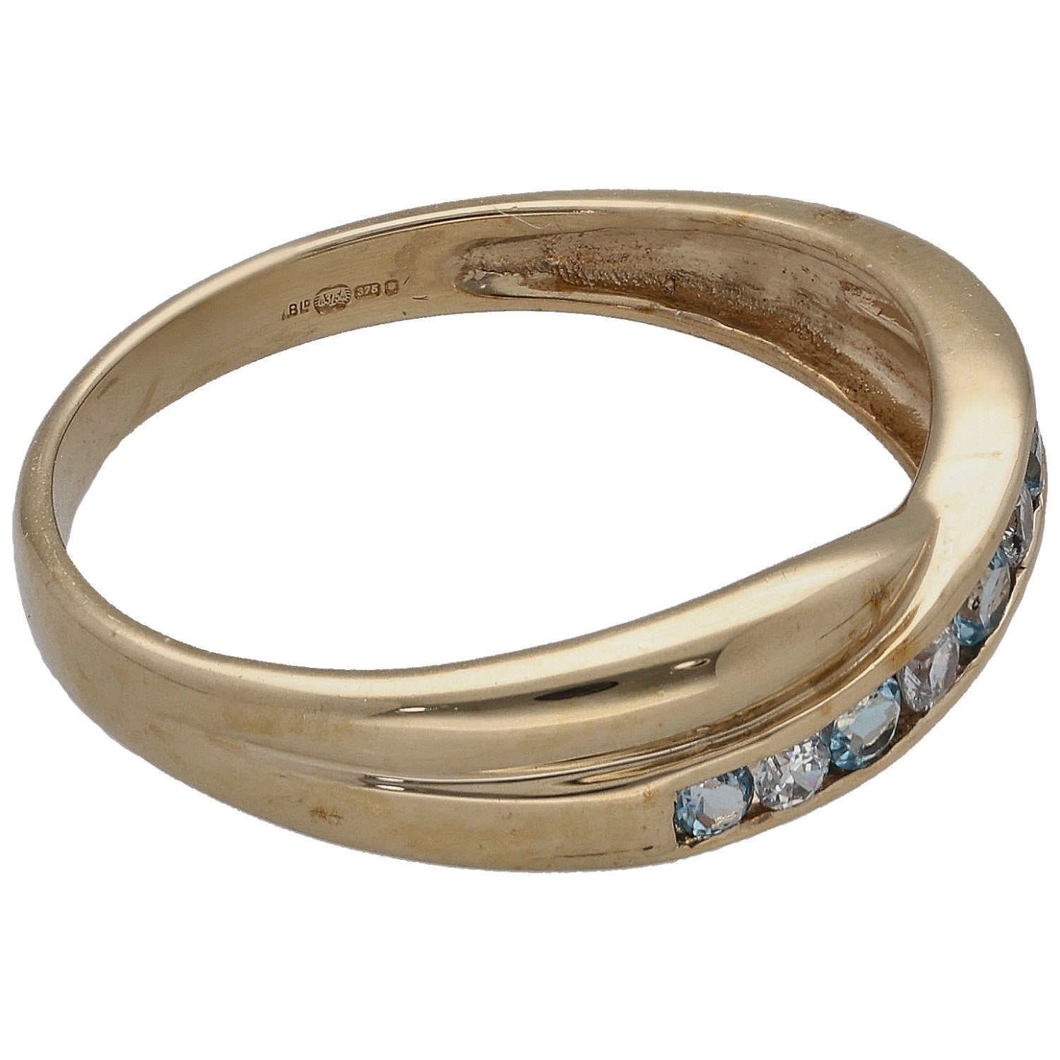 Gold ring profile with blue gemstone accents along the outer edge