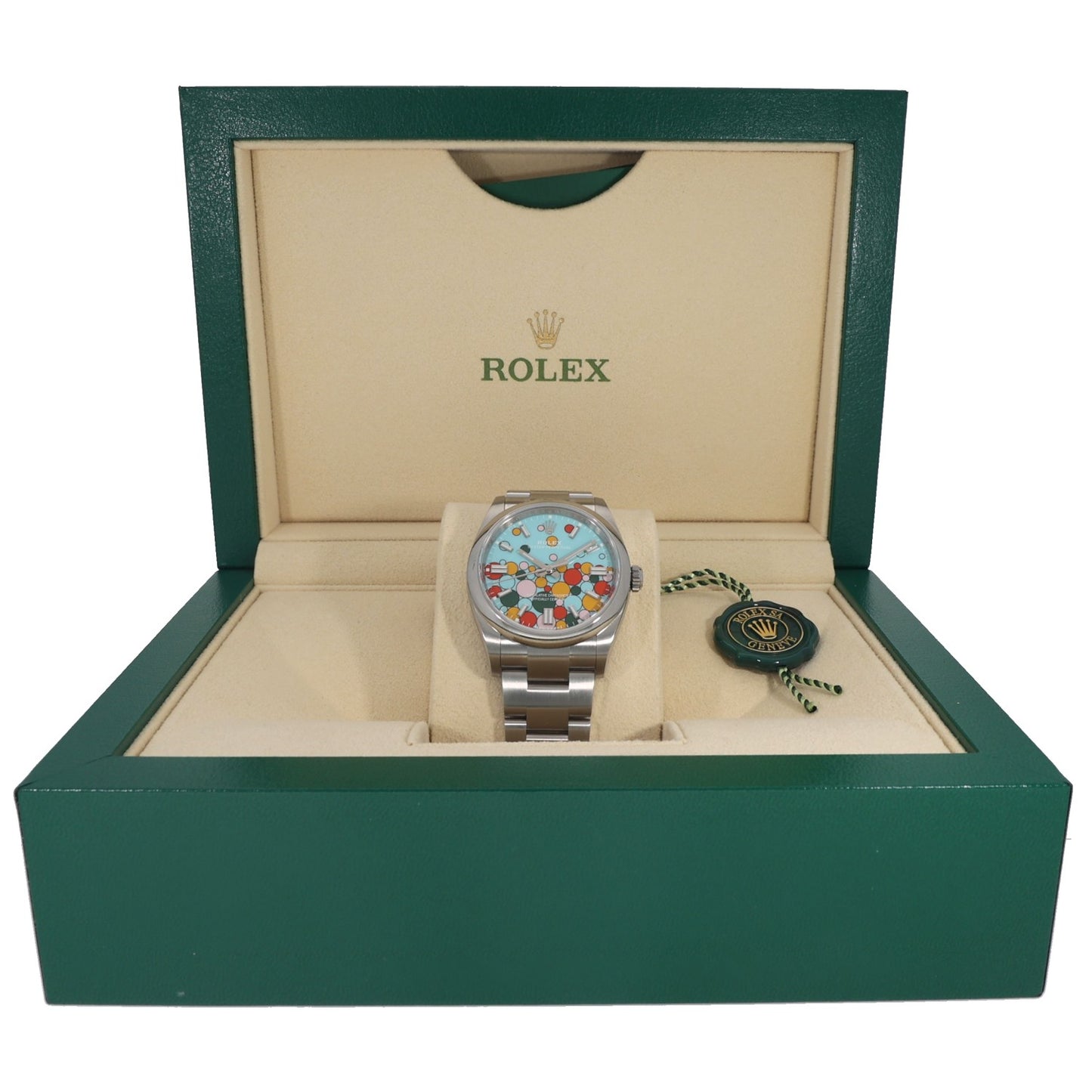 Rolex Oyster Perpetual 126000 35mm watch displayed in green presentation box with keys