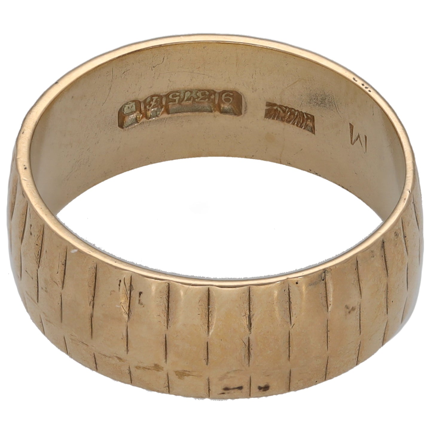 9ct gold patterned wedding ring with hallmarks on inner band and textured exterior