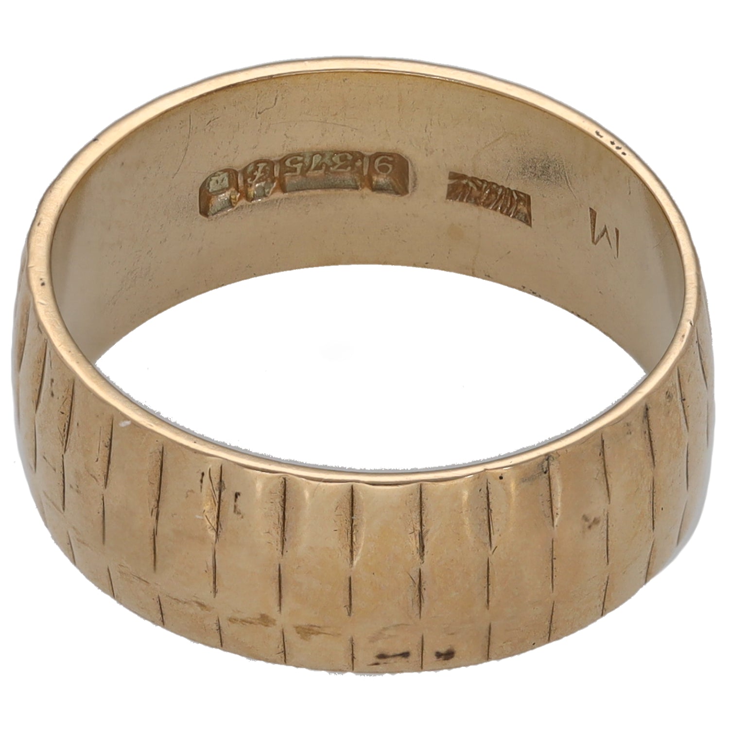 9ct gold patterned wedding ring with hallmarks on inner band and textured exterior
