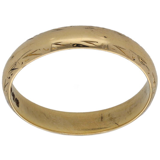 Gold wedding ring band with subtle engraved pattern, plain profile