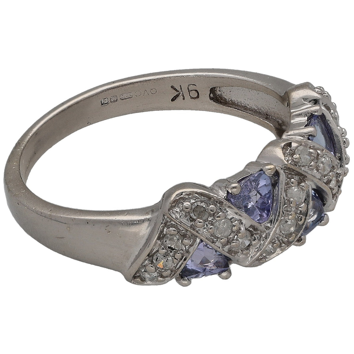 White gold ring side view, inside band marked 916, blue stone with diamond accents
