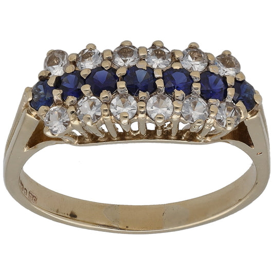 Gold-tone half eternity ring with blue and clear stone row, size Q