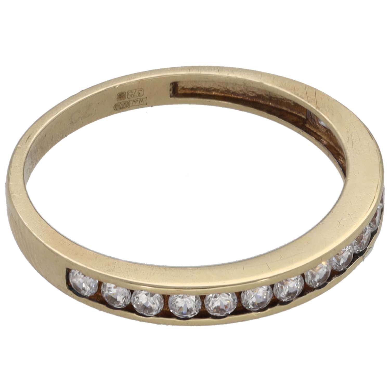 9ct gold CZ half-eternity ring with clear round stones on bottom half, side view