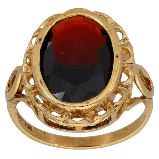 9ct gold ring with bezel-set oval red gemstone and openwork band, size K