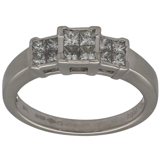 Square diamond cluster ring in platinum with princess-cut stones, side prongs visible.