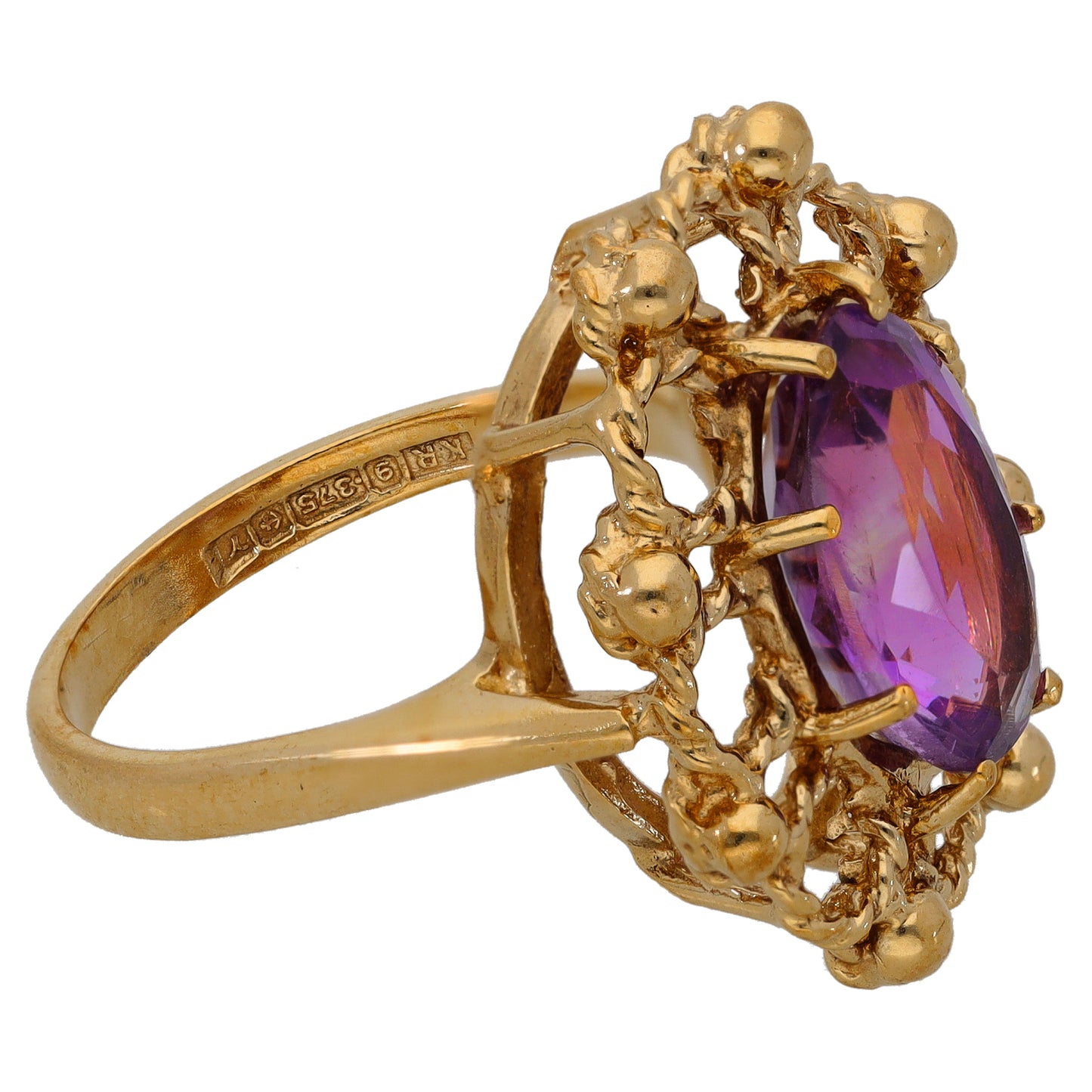 9ct gold amethyst ring with oval purple gemstone and ornate openwork setting