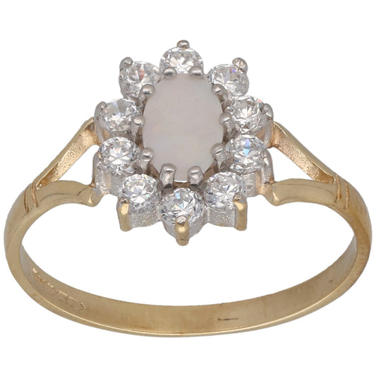 9ct gold cocktail ring with round center stone and CZ halo, openwork band