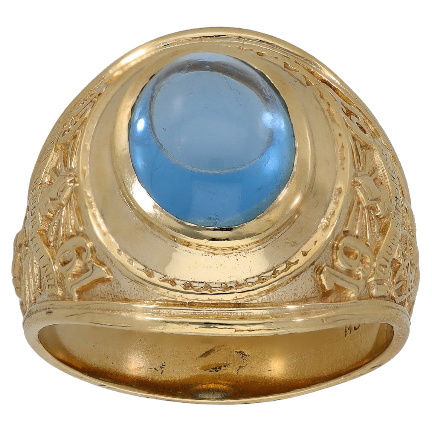 Gold-tone ring with oval blue single stone and engraved band, front view