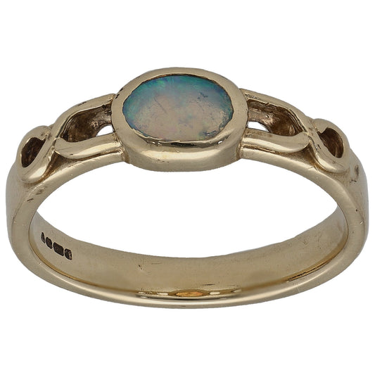 Gold oval opal single-stone ring with raised bezel setting and polished band