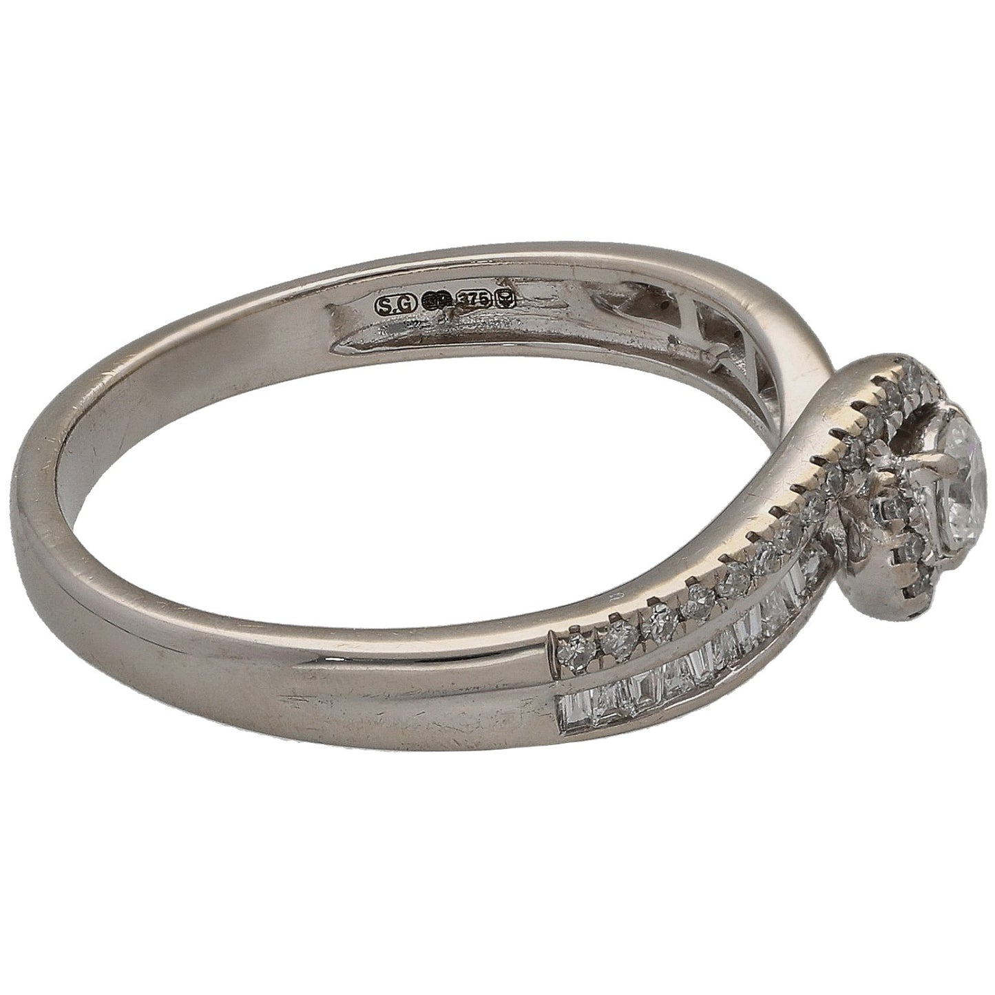 White gold diamond ring with round halo and baguette-cut stones around center.