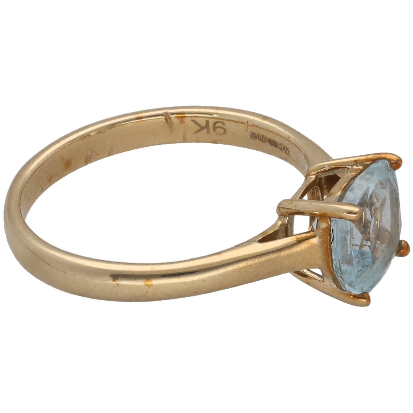 9ct gold ring with light blue aquamarine cushion stone in four-prong setting