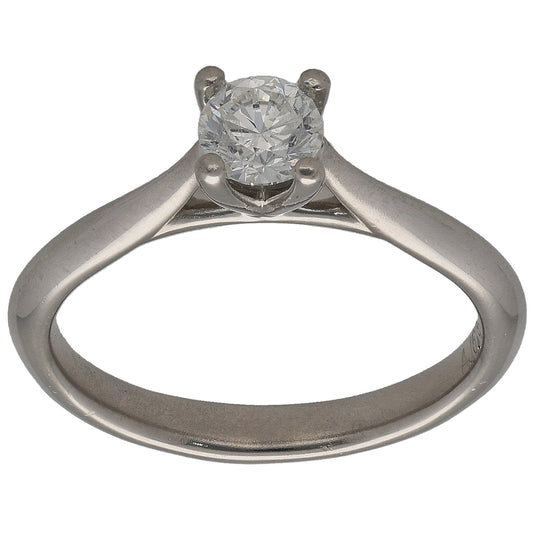 Platinum round diamond solitaire ring with four-prong setting