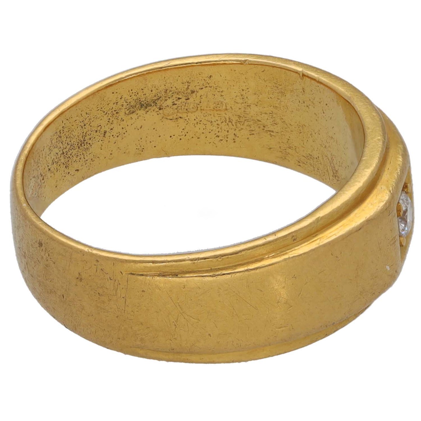 Gold-tone CZ ring band with textured finish and smooth top edge