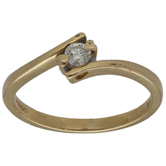 18ct gold solitaire ring with round diamond in four-prong setting, side view