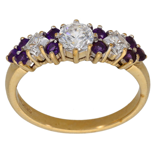9ct gold ring with central round clear CZ and purple amethyst side stones