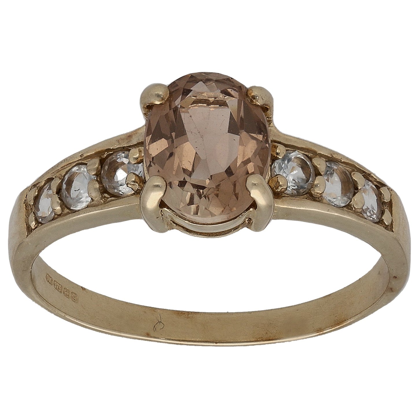 Gold-tone ring with large oval smoky center stone and small clear side accents