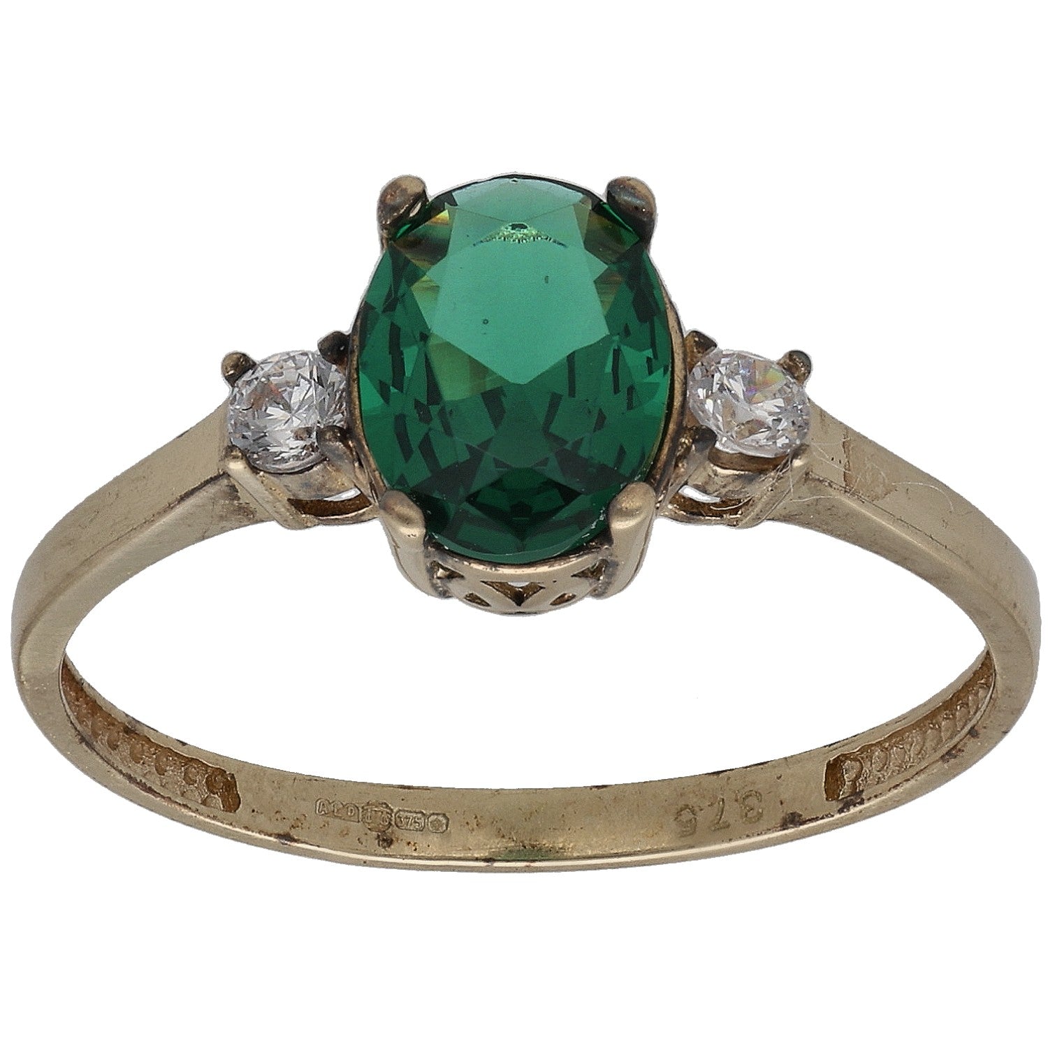 Gold-tone ring with green oval center stone and two clear round accent stones