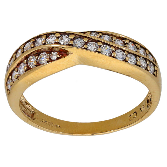 Gold half-eternity CZ ring, faceted stones across the top band