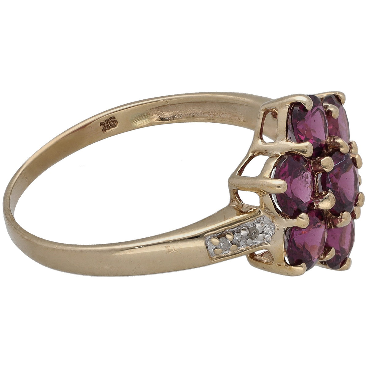Yellow gold ring with maroon garnet side cluster and diamond accents on band