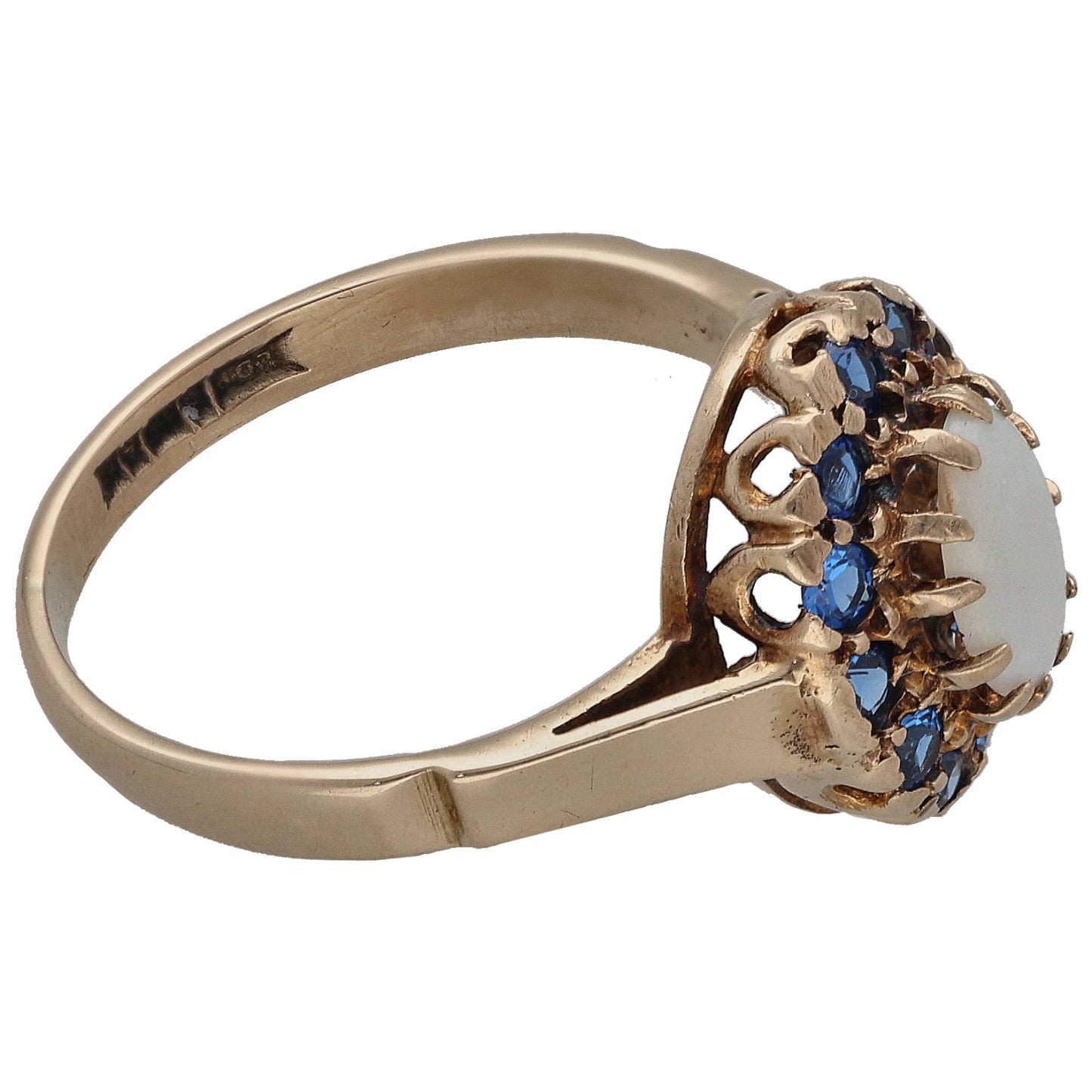 9ct gold ring side view, oval opal center with blue sapphire cluster setting