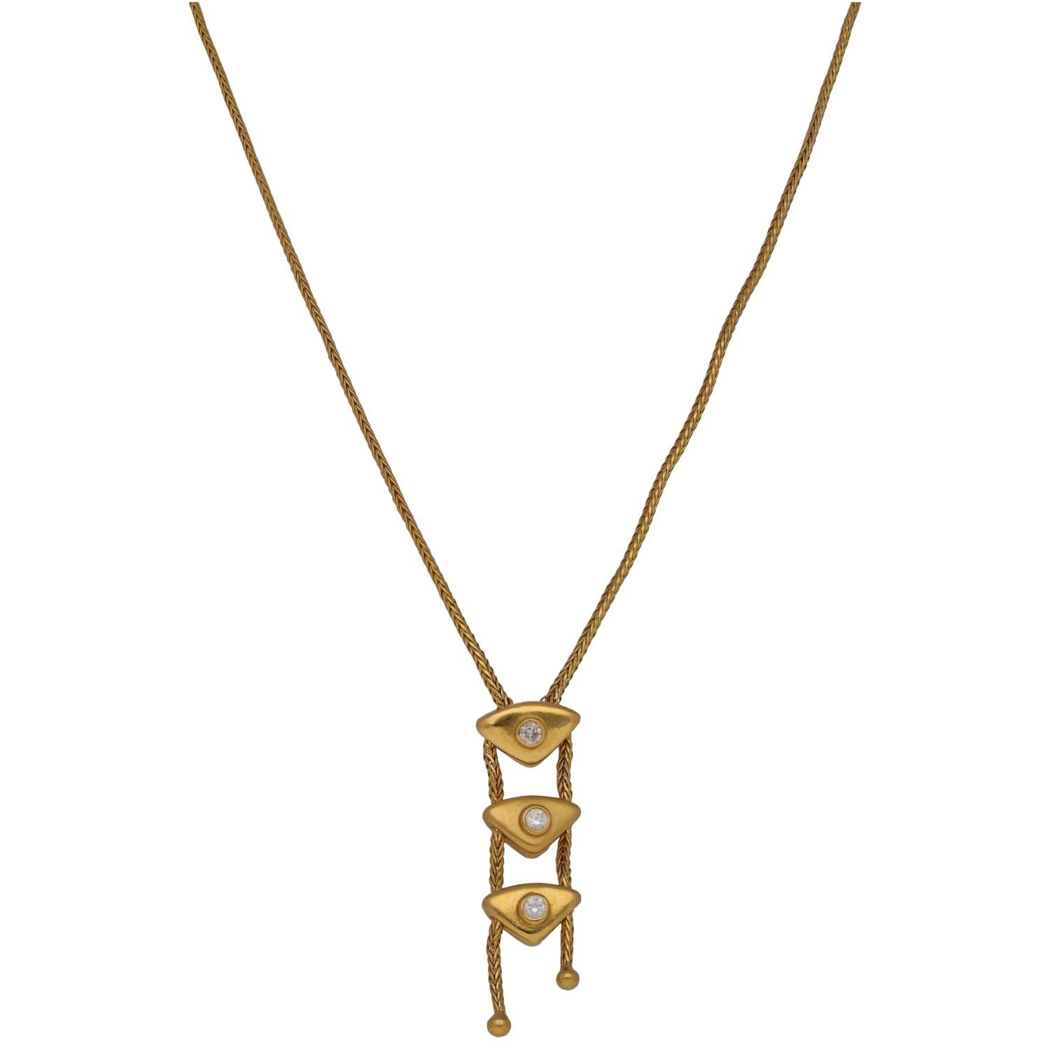 Gold-tone CZ heart pendant necklace with three stacked heart stones and cable chain