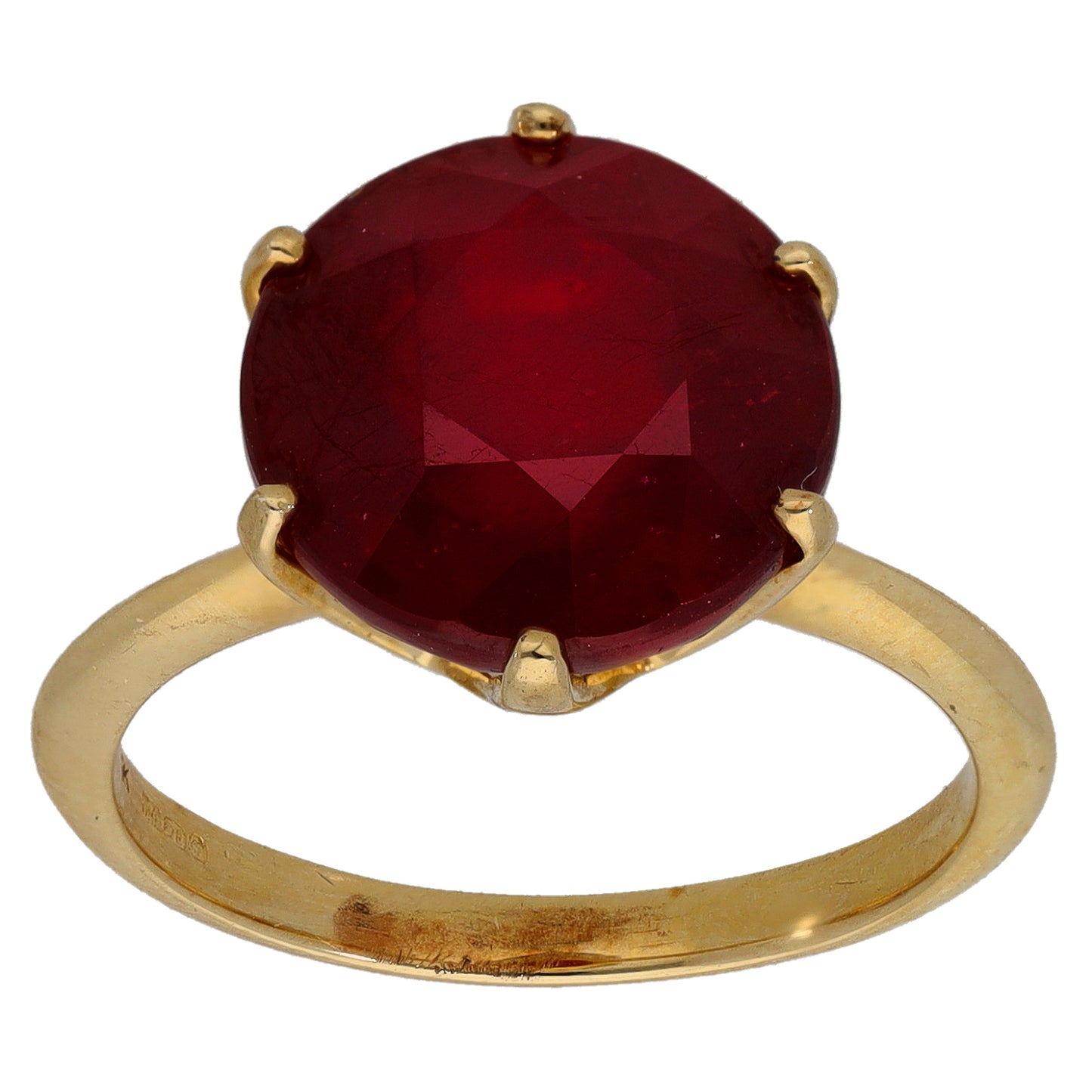 Gold ring with large round dark red gemstone, four-prong setting