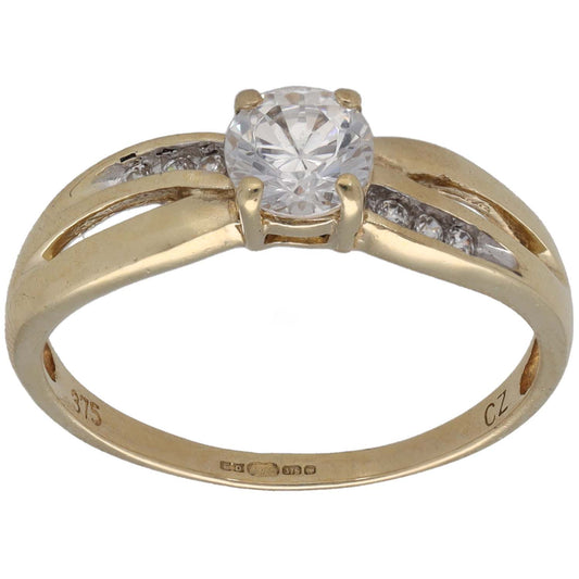 Gold CZ single-stone ring with small side accent stones and raised round center
