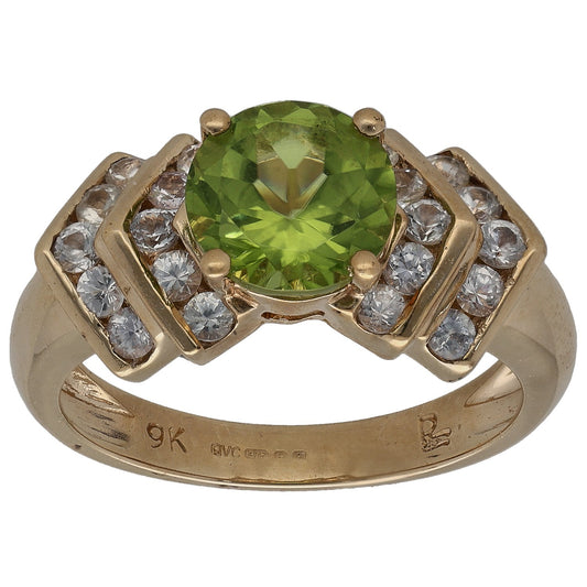 9ct gold ring with large green oval stone, clear side stones, and open split shoulders