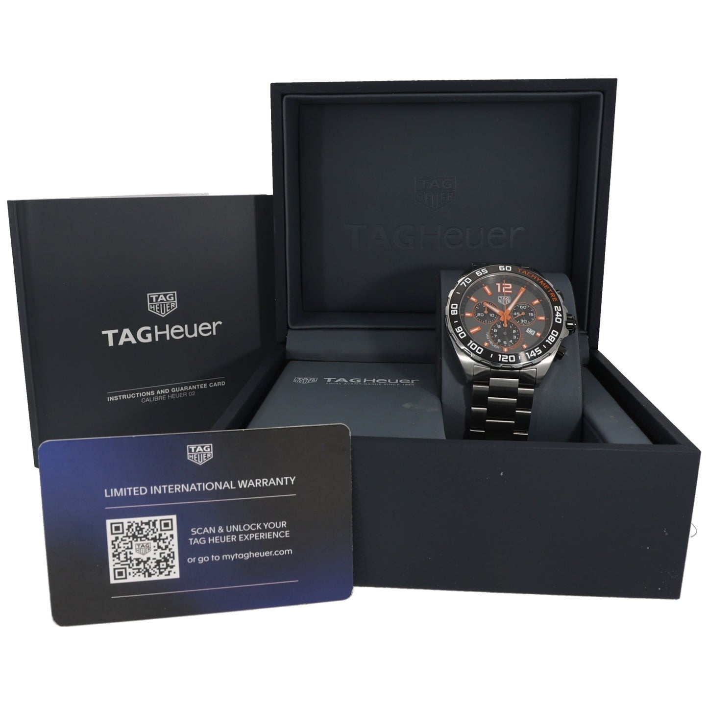 Tag Heuer F1 CAZ101AH stainless steel watch resting in open presentation box.