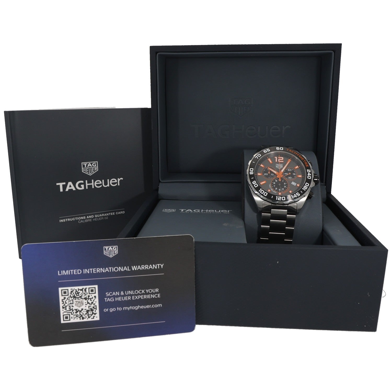Tag Heuer F1 CAZ101AH stainless steel watch resting in open presentation box.