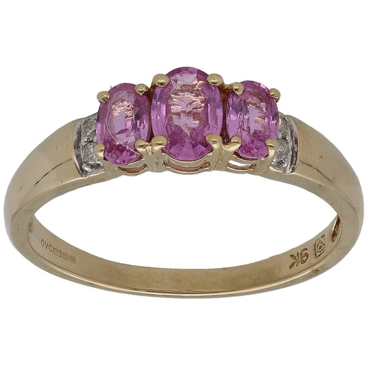 9ct gold ring with three oval pink sapphires and gold bead settings