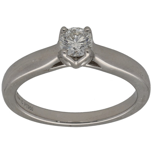 Platinum solitaire ring with round diamond in a four-prong setting