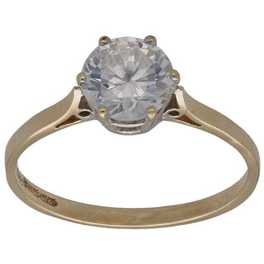 Gold-tone ring with round clear CZ center stone and four prong setting