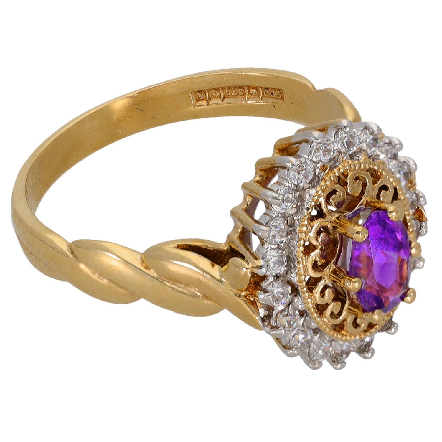 Gold cocktail ring with oval amethyst center and round CZ halo, side view