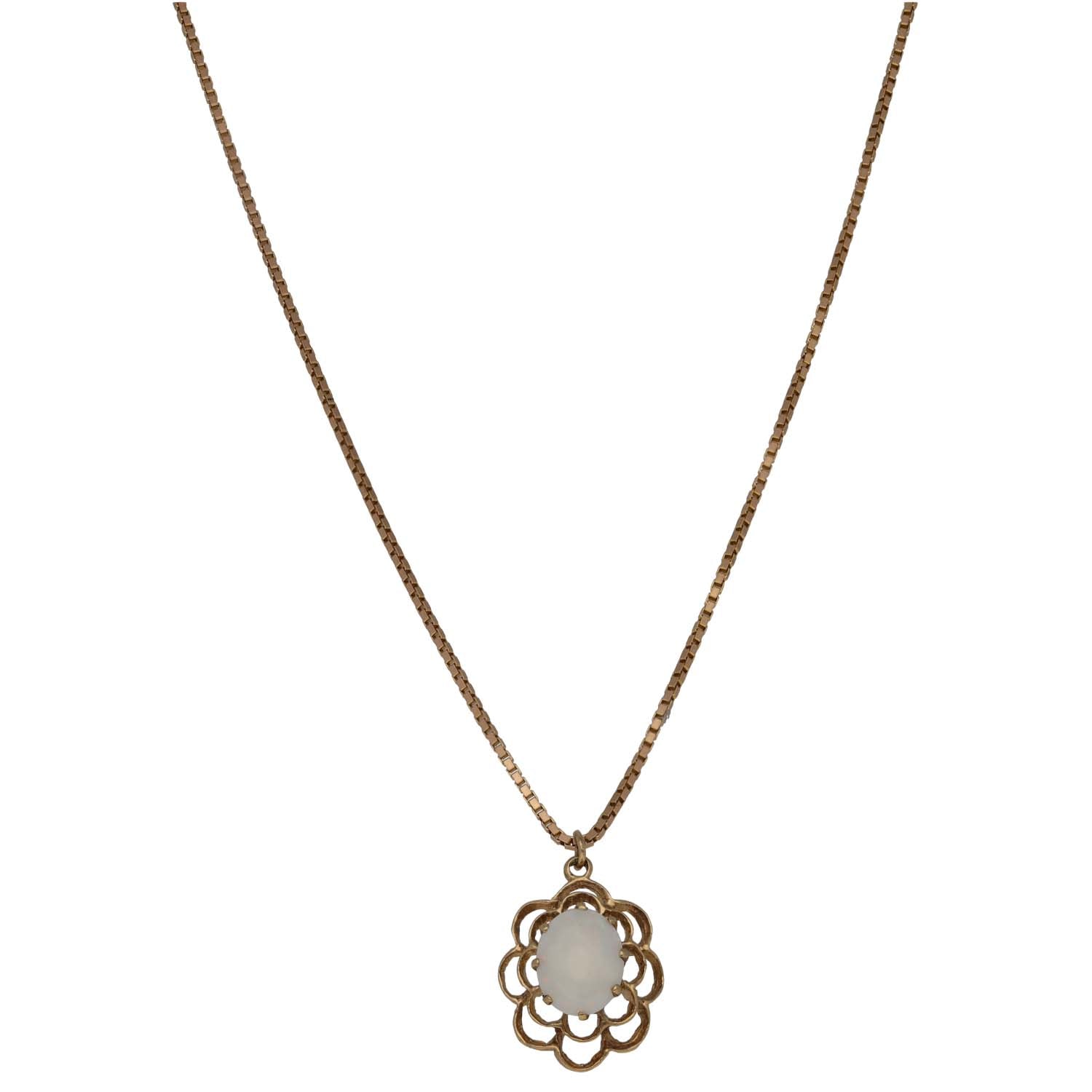9ct gold floral pendant with white opal-like cabochon on chain