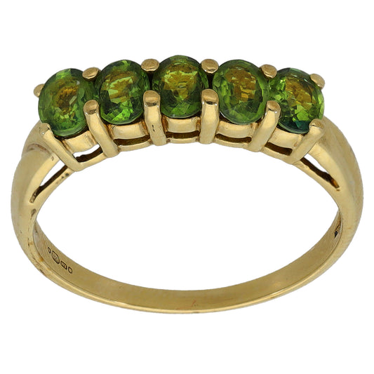 9ct gold half-eternity ring with green oval gemstone rows