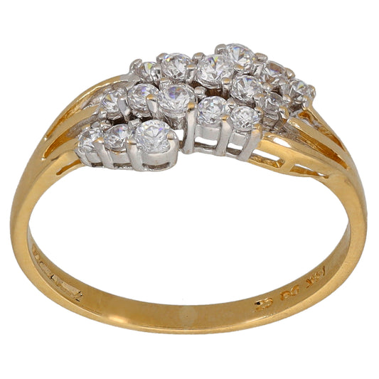 Gold band ring with stepped clear CZ halo and grid-set stones across the top