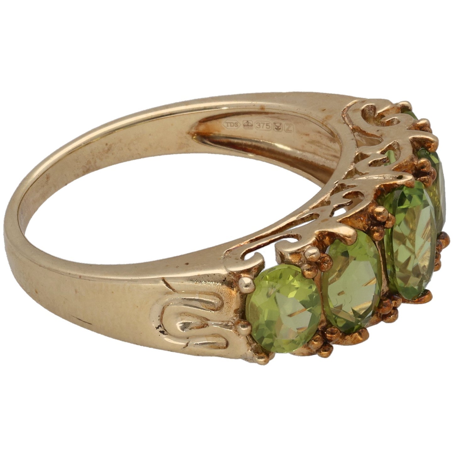 9ct gold ring side view with oval green peridot stones and openwork detailing