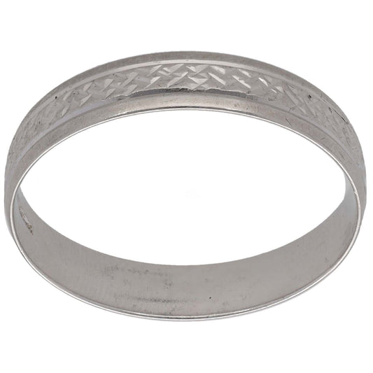 White gold patterned wedding band with textured diamond-cut side detail