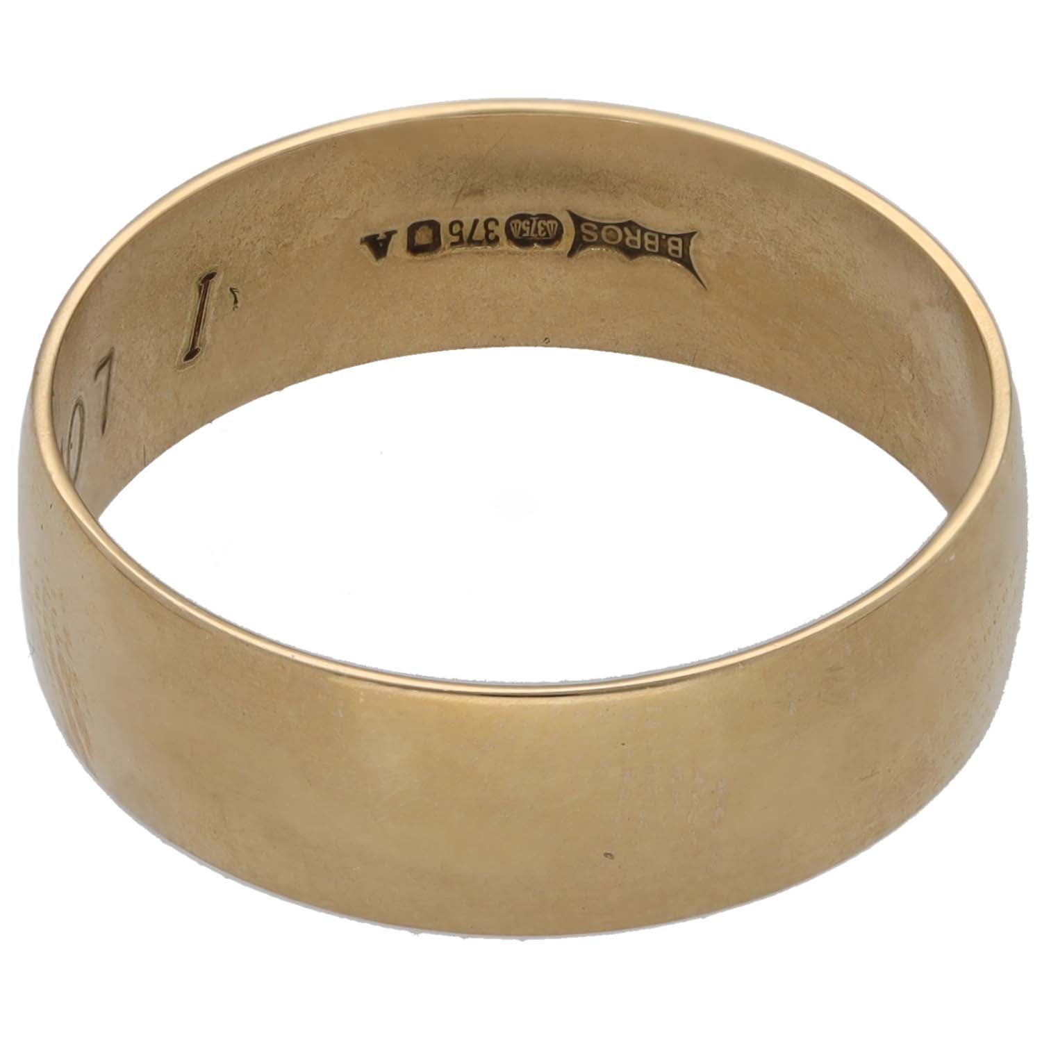 Gold wedding ring, smooth band with stamped interior text
